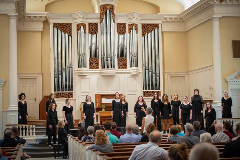 Meredith Choral Singing in Jones Chapel in front of live audience.